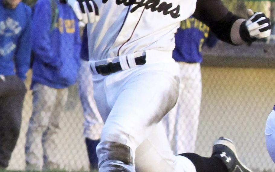 Zama's Lawrence Miner crosses home plate against Yokota during Tuesday's DODDS Japan/Kanto Plain baseball game. The host Trojans edged the Panthers 3-1 in a pitchers' duel as Yokota's Leo Austin and Zama's Keiyl Sasano combined for 24 strikeouts.