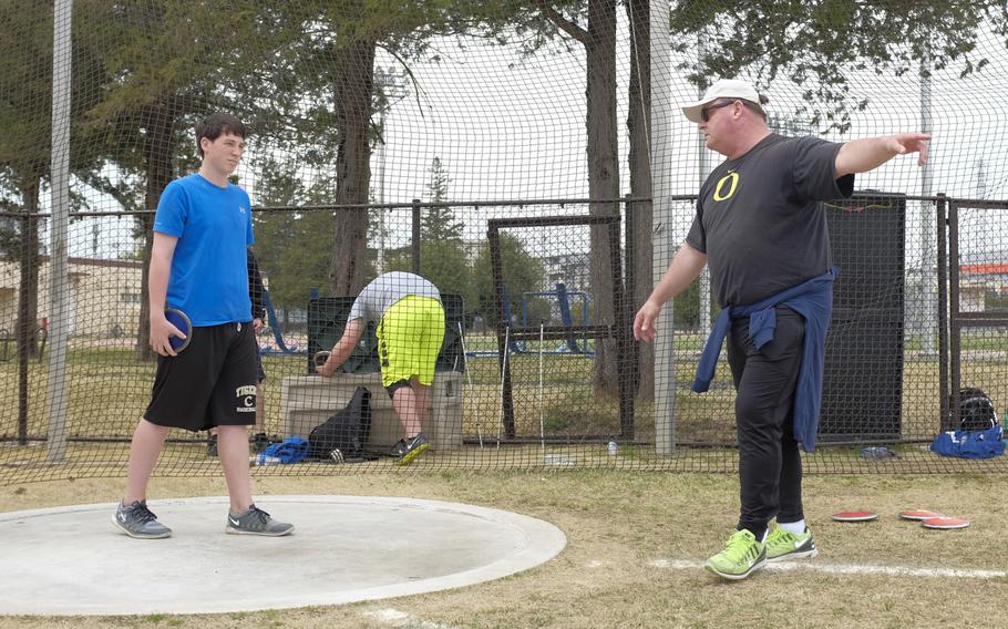 Ken Flax, a two-time Olympian and the NCAA record holder in the hammer throw, coaches high school and middle school athletes at Yokota Air Base, Japan on Sunday, March 29, 2015. Flax was among four former Olympians to visit Yokota as part of the World Records Camp.