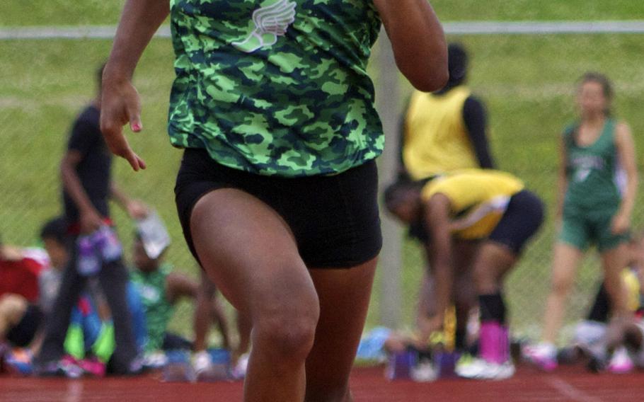 Kaelyn Francis pounds for the finish of the Mike Petty meet 100-meter dash, which she won with a time of 12.08 seconds.