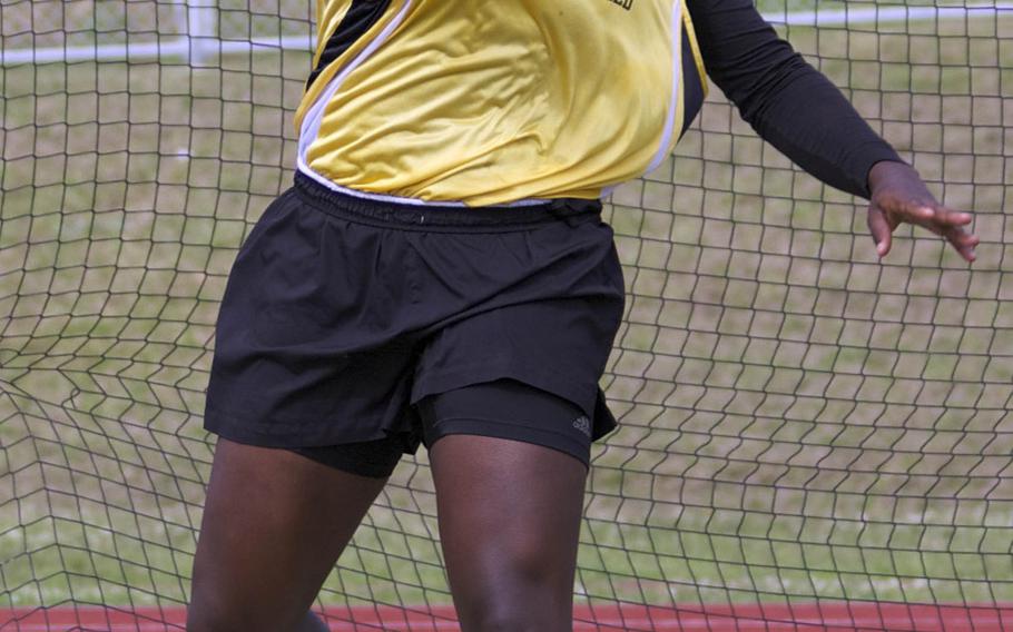 Jazmyn Sharper of Kadena tosses the discus en route to taking first during the Mike Petty meet; she won with a throw of 91 feet, 6 inches.