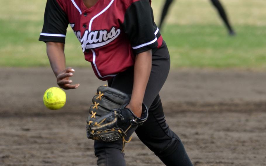 Zama's Kimani Ferguson delivers against Robert D. Edgren during Friday's pool-play game in the DODDS Japan softball tournament. Ferguson got the win in a 23-3 victory over the Eagles, after getting the save as the Trojans edged host Yokota 10-9.