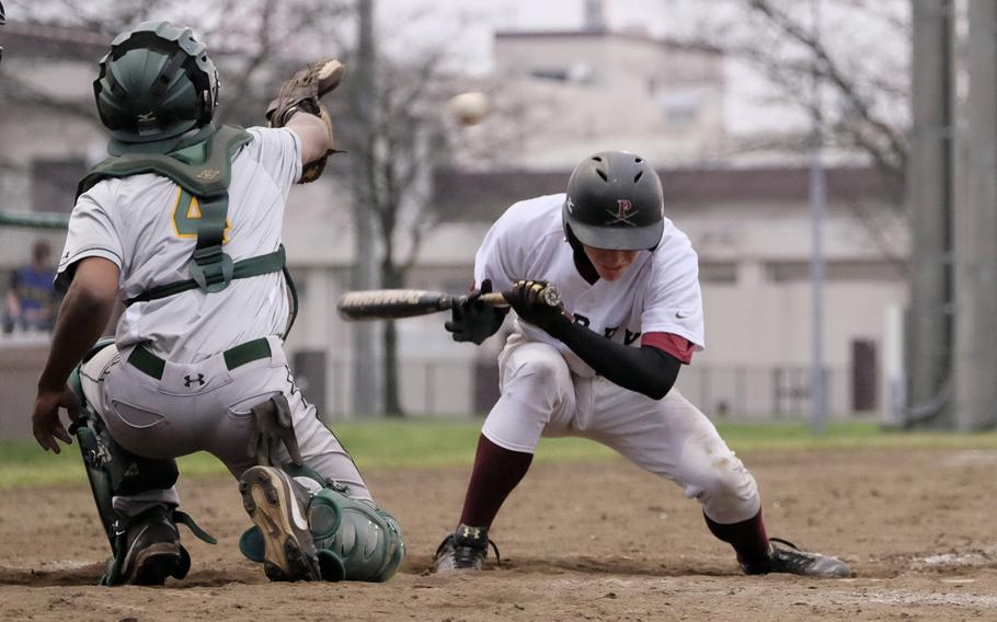 M.C. Perry's Lewis Billups ducks out of the way of an errant pitch against Robert D. Edgren during the DODDS Japan Tournament at Camp Zama, Japan, on Friday, April 17, 2015. Perry went on to win 13-1.