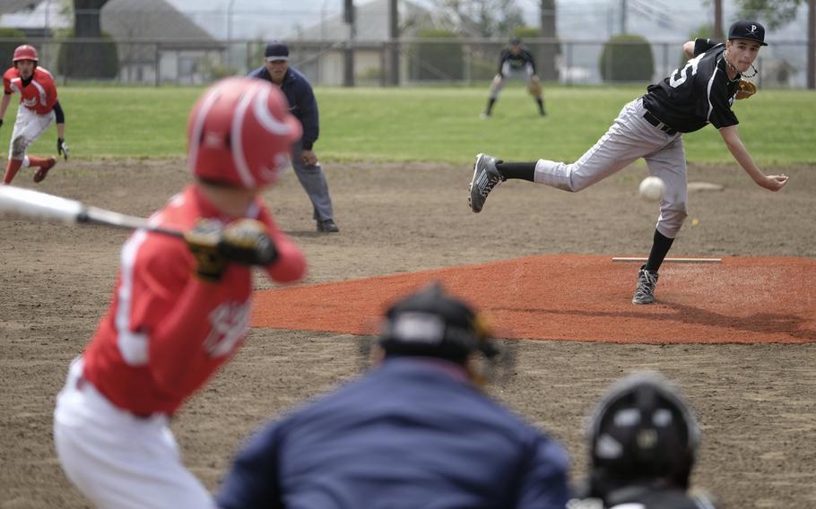 Matthew C. Perry's Cullen Waugh pitches to Nile C. Kinnick during the DODDS Japan Tournament in Camp Zama, Japan on April 18, 2015. Waugh would pick up the win in the Samurai 3-2 victory.