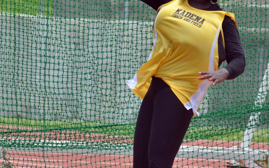 Kadena's Jazmyn Sharper set a district record with a discus throw of 30.30 meters, breaking the eight-year-old mark of 28.74 set by LaKesa McClain of Kubasaki.