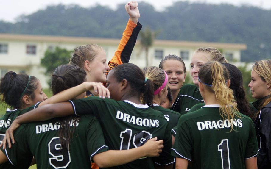 Wet weather did little to dampen the spirits of Kubasaki's girls, who won their second straight Far East title in soccer.