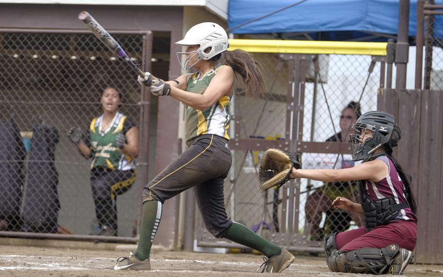 Robert D. Edgren's Raeven Moore slaps a double into left field during the Far East Division II Softball Tournament consolation rounds at Yokota Air Base, Japan on May 20, 2015. Edgren defeated Perry 11-10.