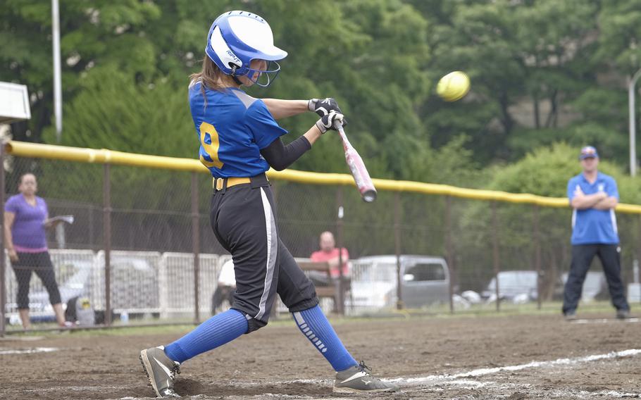Yokota's Kaia Austin hits a triple during pool play of the Far East Tournament at Yokota Air Base, Japan on May 19, 2015. Osan defeated Daegu 8-5 to take the top seed in their bracket. Austin has been named the 2015 Stars and Stripes softball Athlete of the Year.