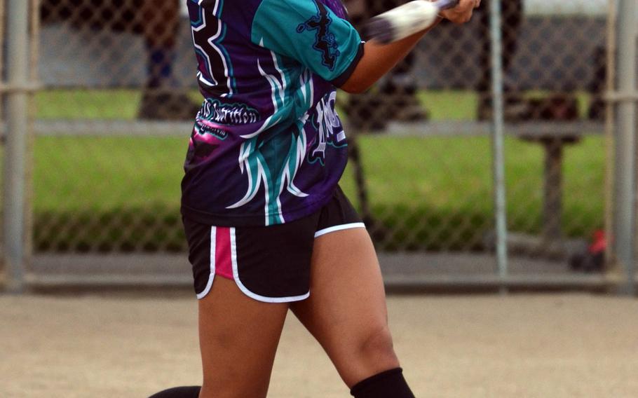 Okinawa Dragons pinch-hitter Destiny Velarde connects on a bases-clearing double against Misfitz in the women's opening game in the 2015 Firecracker Shootout Softball Tournament. The two-time defending champion Dragons beat Misfitz 13-3. Velarde is a sophomore at Kubasaki High School who played for the Far East Division I Tournament runner-up Dragons as a freshman last season.