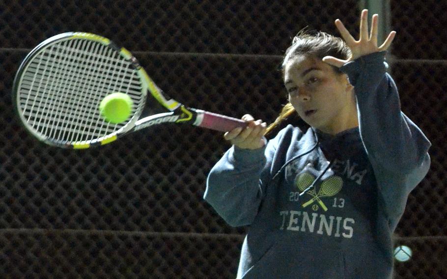 Kadena freshman Maddie Howard smacks a forehand return against Kubasaki's Haley Agra during a match Wednesday, Oct. 21, 2015, in the Okinawa district singles tennis finals. Howard rallied for a 4-6, 6-4, 6-2 win.