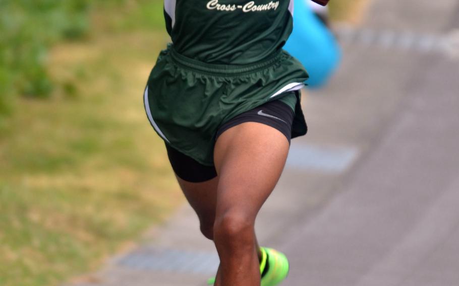 Kubasaki senior Johnathon Johnson heads for the finish Wednesday, Oct. 21, 2015, of the Okinawa cross-country district finals. Johnson won in 16 minutes, 50 seconds.