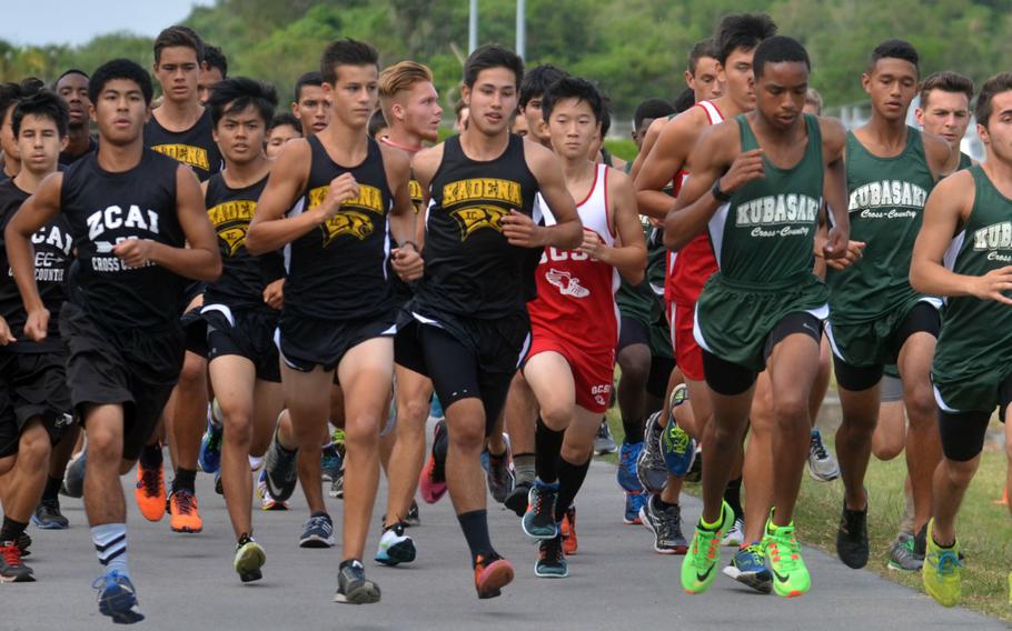 Kubasaki senior Johnathon Johnson, 3rd from right, starts to take off from the pack Wednesday, Oct. 21, 2015, at the start of the Okinawa cross-country district finals. Johnson won with a time of 16 minutes, 50 seconds.
