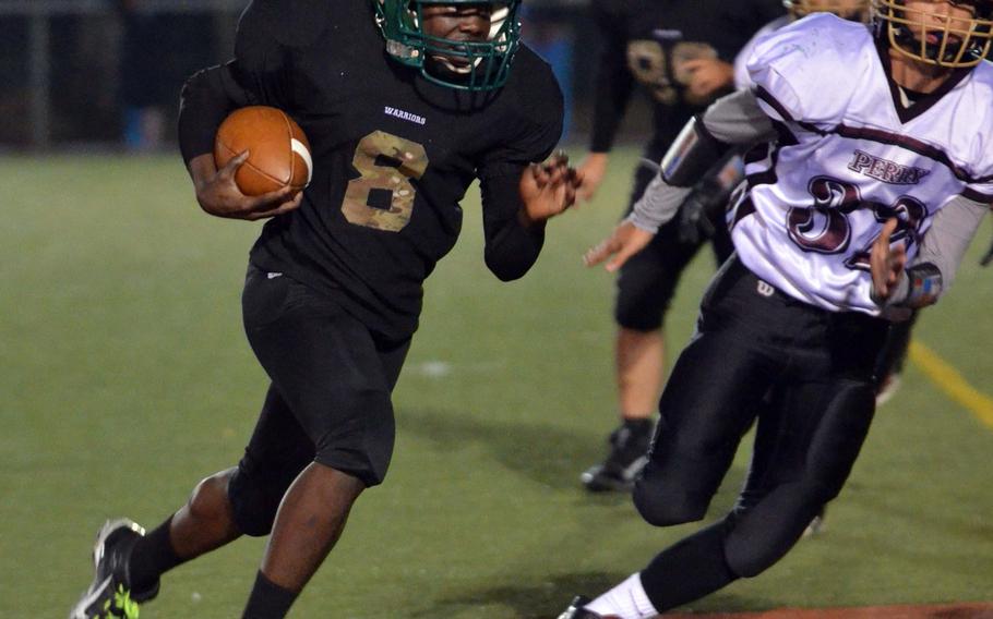 Daegu RB Yechiel Peterson dashes into the end zone past Matthew C. Perry defender Andrew Borrero.