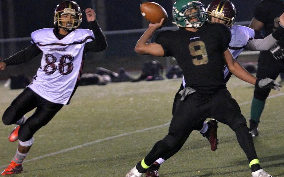 Daegu QB DeAndre Rosalie tosses one of his two touchdown passes just ahead of Matthew C. Perry's defensive rush.