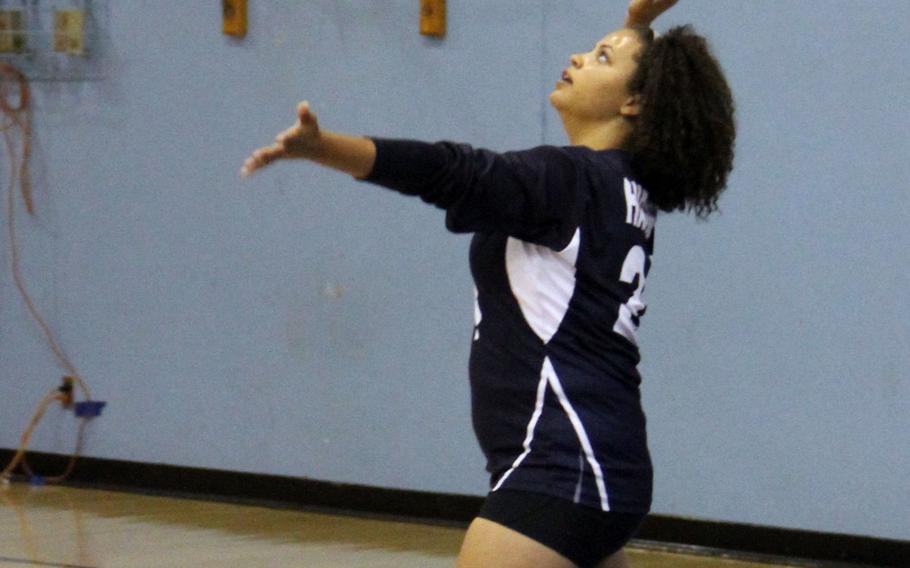 Seoul American's Alexis Harrod readies a serve during Tuesday's round-robin play in the Far East Division I volleyball tournament. Harrod and the Falcons finished last in round-robin play and got the seventh and last seed entering the playoffs which start Wednesday.