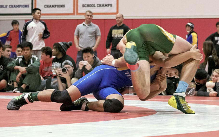 St. Mary's Ryo Osawa defets Sky Phillips of Robert D. Edgren in the Beast of the East 129-pound finals Saturday, Jan. 9, 2016, at Nile C. Kinnick High School in Yokosuka, Japan.