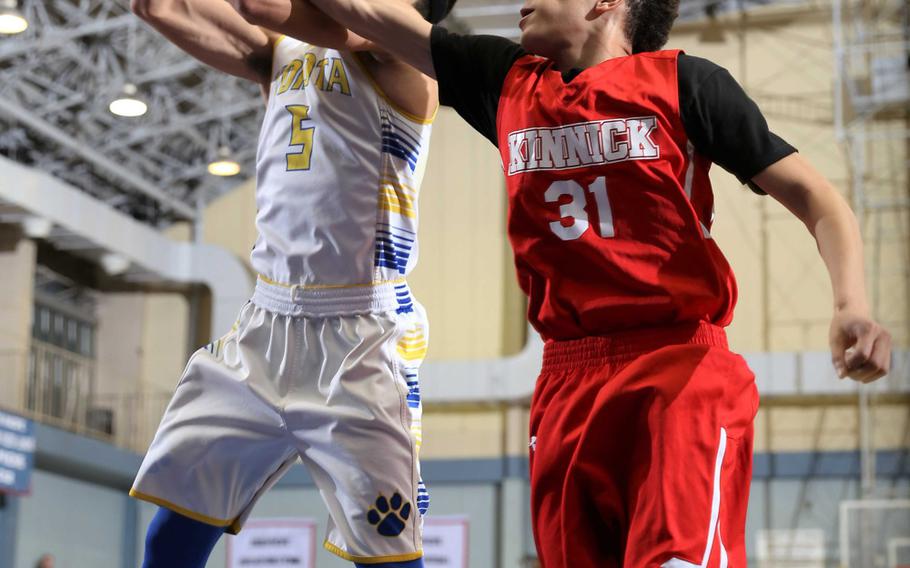 Junior Shota Sprunger, left, and the Yokota Panthers face off Saturday against Kubasaki at American School In Japan in a showdown between the reigning Far East Divisions II and I Tournament champions.