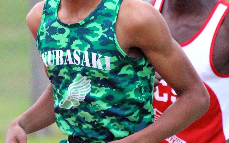 Kubasaki's Jonathan Johnson won the boys 3,200 and 1,600 races during Friday's season-opening Okinawa track and field meet.