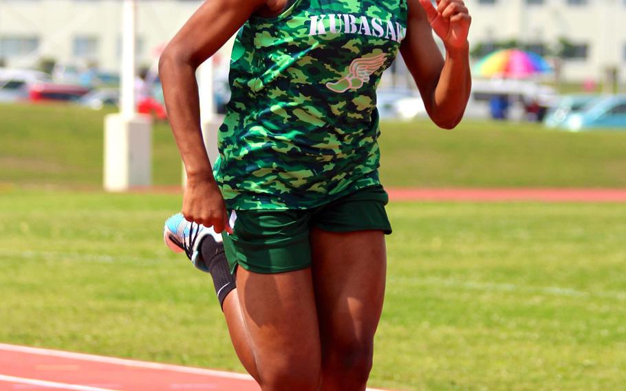 Kubasaki's Kaelyn Francis steams toward the finish of the 200-meter dash during Saturday's Okinawa track and field meet at Kadena. Francis won with a time of 26.94 seconds.