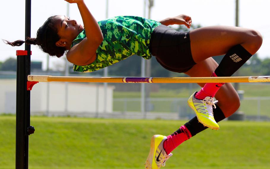 Kubasaki's Alanna Stein clears the high jump bar during Saturday's Okinawa track and field meet at Kadena. Stein won the event for the second straight week, this time with a height of 4 feet, 10 inches.