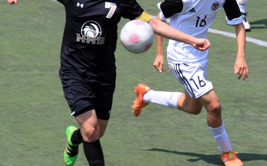 Humphreys' Felipe Webster-Lopez tries to settle the ball in front of Taejon Christian's Daniel Lee during Friday's Korea Blue boys tournament quarterfinal, won by the Dragons 10-1.