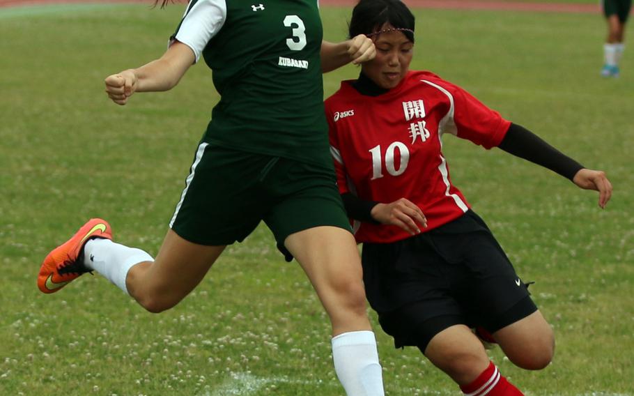 Kubasaki's Chloe' Stevens clears the ball against Kaiho during Sunday's girls soccer game, won by the Dragons 8-0.