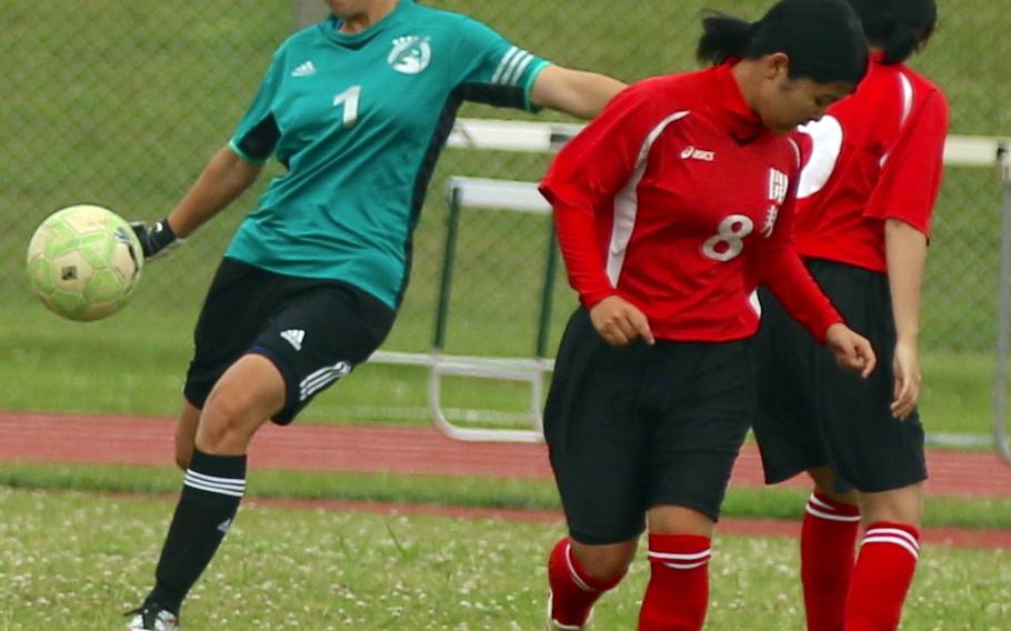 Kubasaki's goalkeeper Lexi Klimek sends a clearing pass against Kaiho during Sunday's girls soccer game, won by the Dragons 8-0.