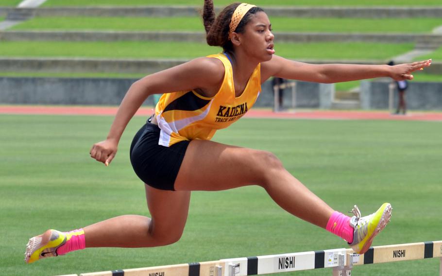 Kadena senior Tiarrah Edwards heads toward the finish of the 300 hurdles. She won that event and the shot put and broke the district record in the 100 hurdles.