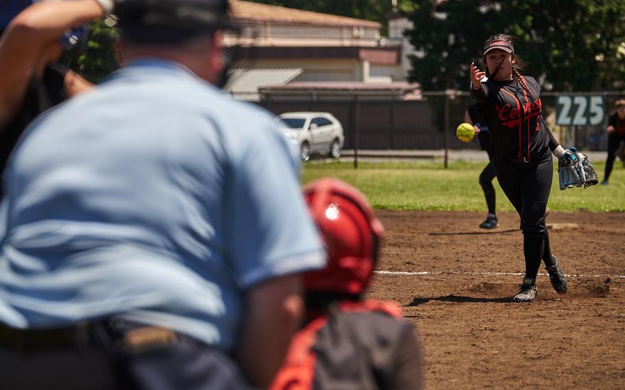 E.J. King's Jaelyn Laurente pitches in the final pool play game of the Far East DII Softball Tournament May 17, 2016 at Yokota Air Base, Japan. Laurente's Cobras played spoiler to Osan American of Osan, South Korea in a 17-16 victory knocking the Cougars from out of the championship bracket.