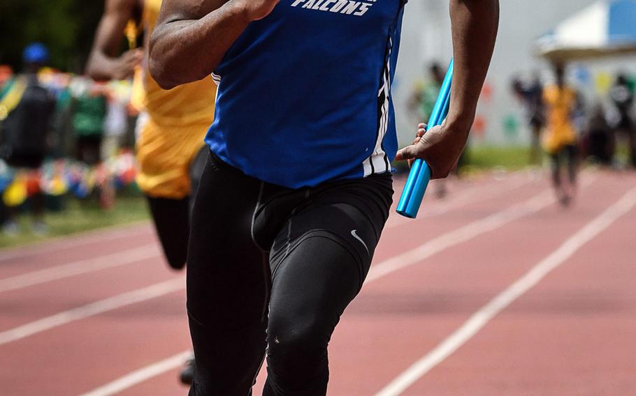 Seoul American senior sprinter Myles Haynes crosses the finish line in record time in the Far East meet boys 400-meter relay. The Falcons clocked 43.61 seconds, .05 faster than the old record of 43.66 set in 2014 by Kubasaki.