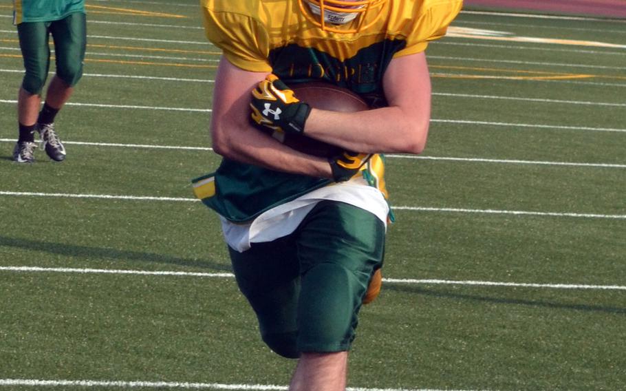 Junior Austin Price is one of a handful of returnees, doubling at linebacker and running back for Edgren.