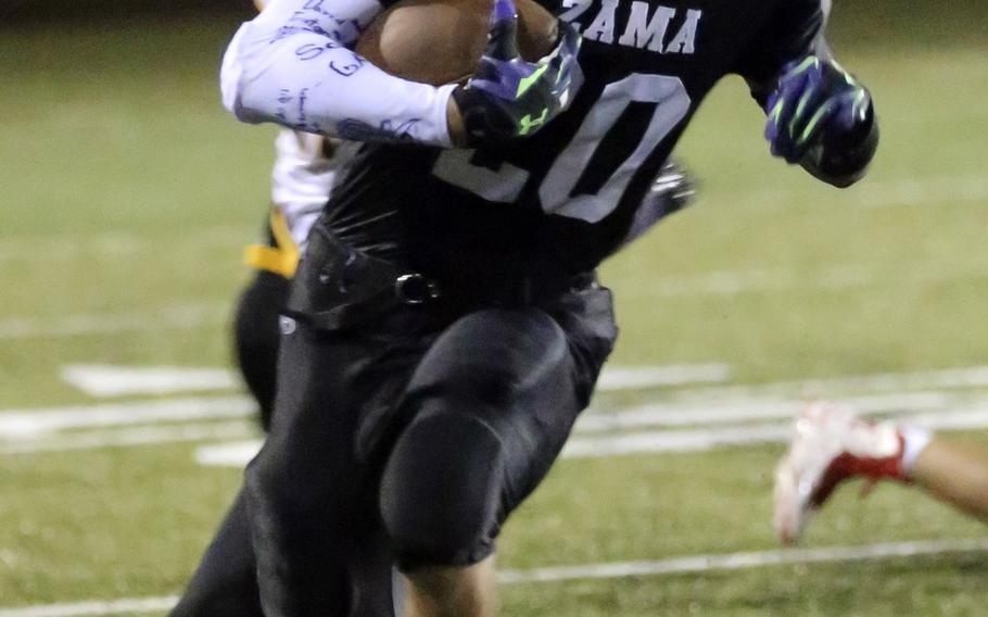 Zama running back Anthony Ames turns upfield against American School In Japan.