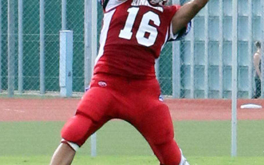 Nile C. Kinnick's Andrew Urrette had one of two interceptions off Kubasaki on Saturday, but the Dragons prevailed 13-6.