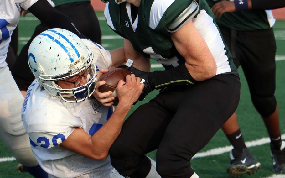Daegu senior quarterback William Bair rushed for two touchdowns and passed for two more against Samsung, a Korean team, during Saturday's game. The Warriors beat the Lions 32-8.