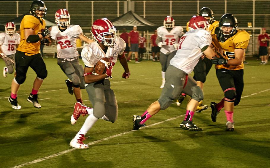 Kinnick return specialist Devon Stanley runs a punt back 54 yards before being tripped up at the ASIJ 12-yard-line Saturday, Oct. 1, 2016 at American School in Japan in Chofu, Japan, The junior wide receiver also returned a kickoff for a touchdown and recovered an onside kick in a game where special teams played an unusually important role.