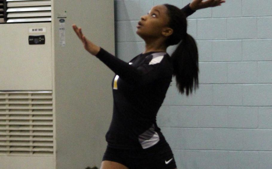 Kadena's Dejaila Simms readies a serve against Seisen during Tuesday's round-robin play in the Far East Division I volleyball tournament. The Panthers beat the Phoenix 26-24, 25-17.