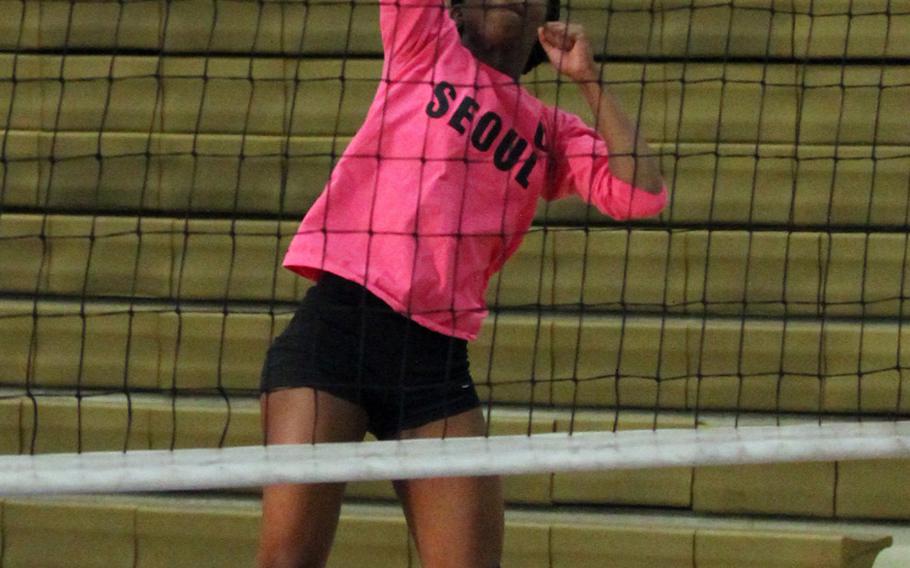 Seoul American's Alyse Neal launches a shot against Seisen during Tuesday's round-robin play in the Far East Division I volleyball tournament. The Phoenix beat the Falcons 25-23, 25-20.