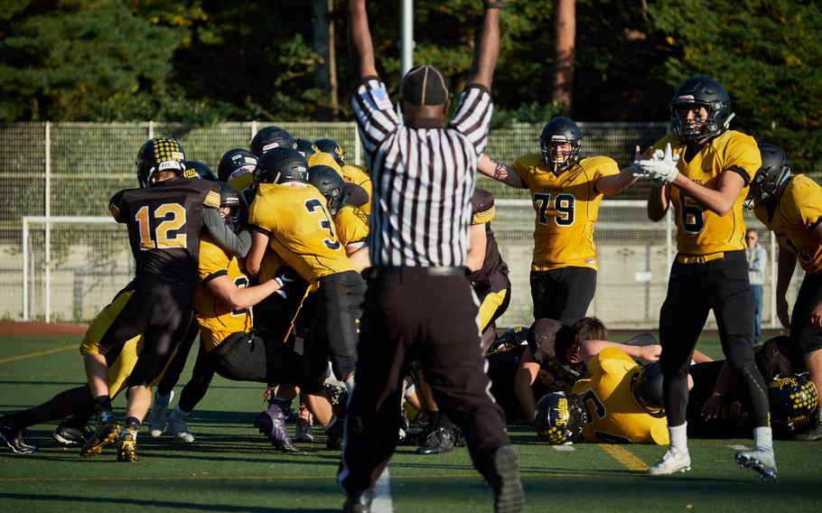 ASIJ quarterback Jack Ambrosino pushes his way into the end zone on a fourth-and-goal just before the half of the Far East Division I Football Championship Saturday at the American School in Japan in Chofu, Japan. ASIJ defeated Kadena 35-18 to claim its first Far East Football crown. 