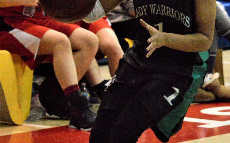 Daegu captain Mylisse Spurgon looks to make a move against Seoul Foreign during Friday's girls basketball game, won by the Crusaders 51-10.