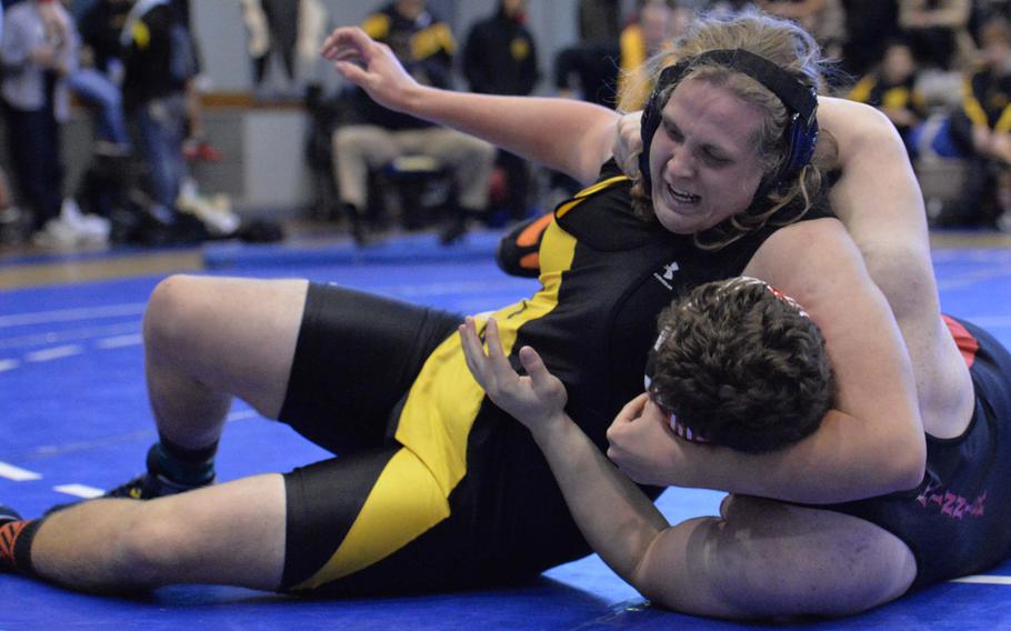 Kadena heavyweight James White gets the upper hand on Nile C. Kinnick's Marc Domery during the championshipl bout in Saturday's "Beast of the Far East" tournament. White pinned Domery in 1 minute, 51 seconds.