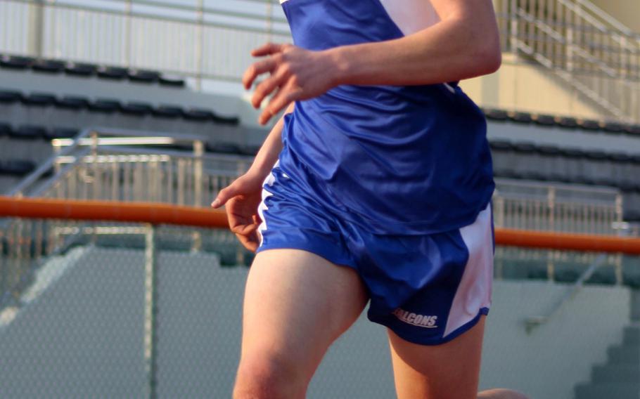 Seoul American's Jack Newton leads the way in the home stretch of the 3,200 in Saturday's season-opening DODEA-Korea meet at Humphreys. Newton, the reigning Korea cross country champion, won both the 1,600 and 3,200 on Saturday.