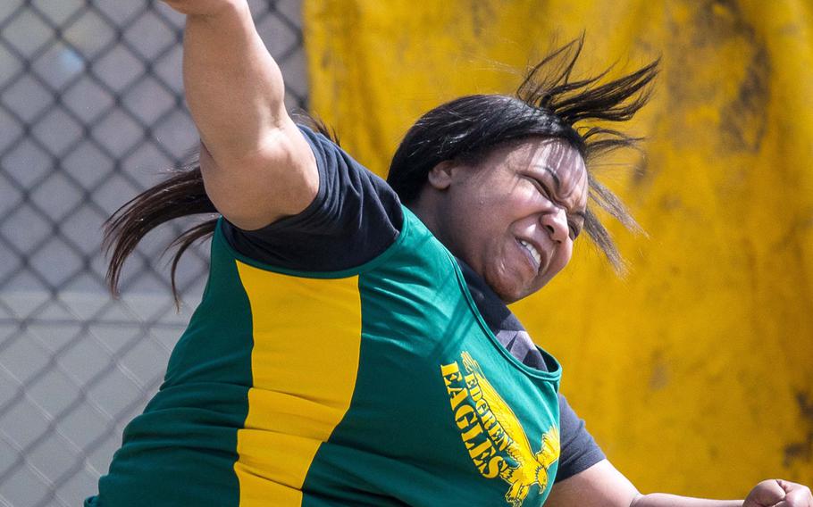 Robert D. Edgren senior Brianna Hunter lets fly with the shot during Saturday's meet at Yokota, breaking her own Pacific record with a throw of 12.33 meters. The transfer from Knob Noster, Mo., broke a 20-year-old Pacific record in the event a week earlier, recording 11.79.