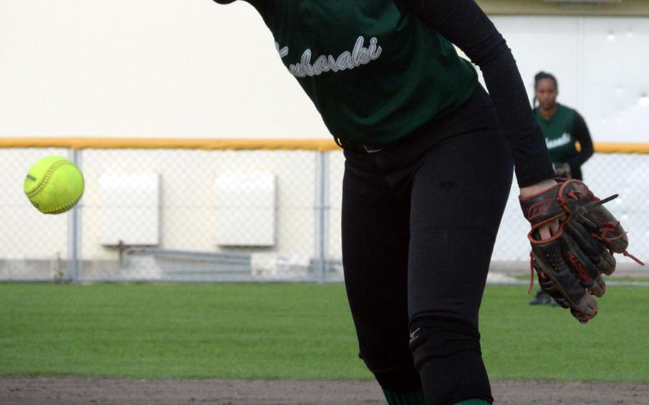 Kubasaki senior right-hander Reaven East rocks and fires against Kadena during Thursday's softball game. The Dragons won 17-14, East improved to 2-0 against the Panthers for the first time in her career and Kubasaki won two straight over Kadena for the first time in five seasons.