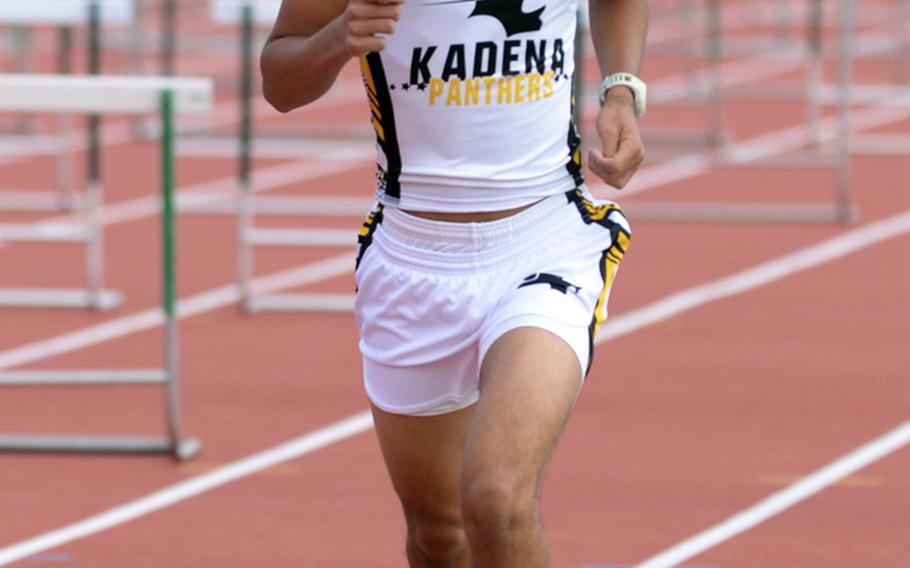 Kadena senior Aziel Rubero pounds for home and to victory in the 3,200 during Friday's 13th Mike Petty Memorial Track and Field Meet. Rubero was timed in 10 minutes, 48.53 seconds.