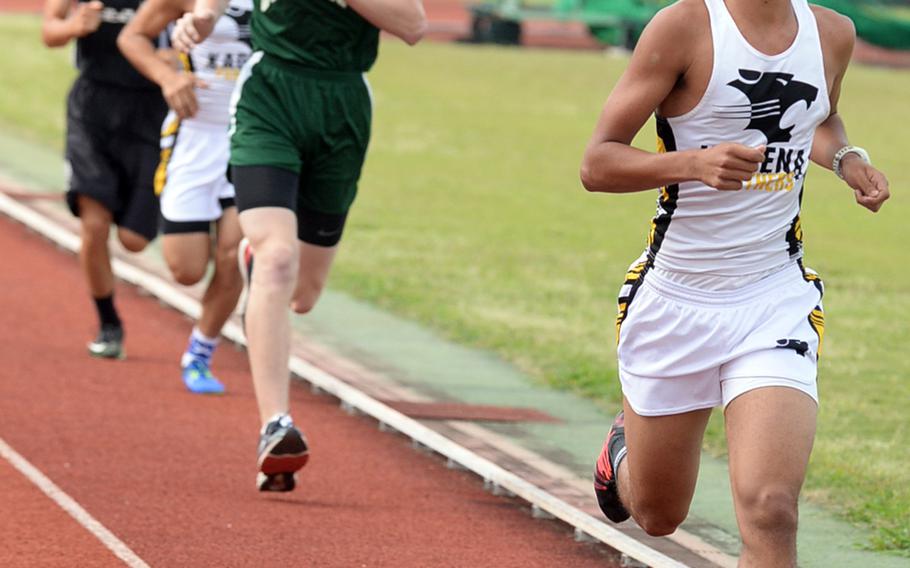 Kadena's Aziel Rubero leads the pack to the finish of the 3,200 during Saturday's Okinawa track and field meet. Rubero won in 10 minutes, 29.31 seconds.