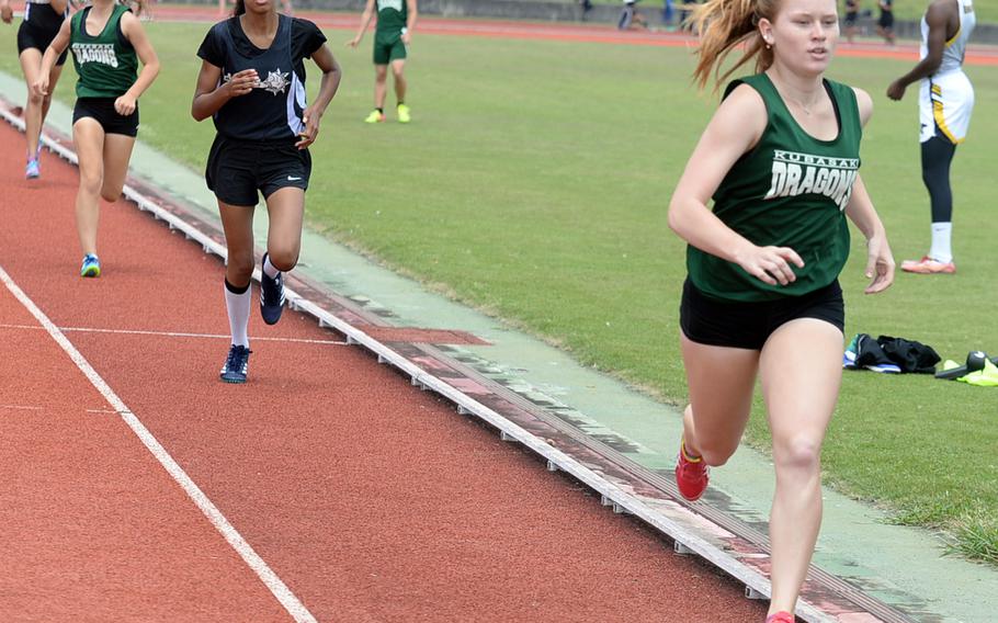 Kubasaki's Elizabeth Joy leads the pack toward the finish of the 800 during Saturday's Okinawa track and field meet. Joy won in 2 minutes, 31.8 seconds.