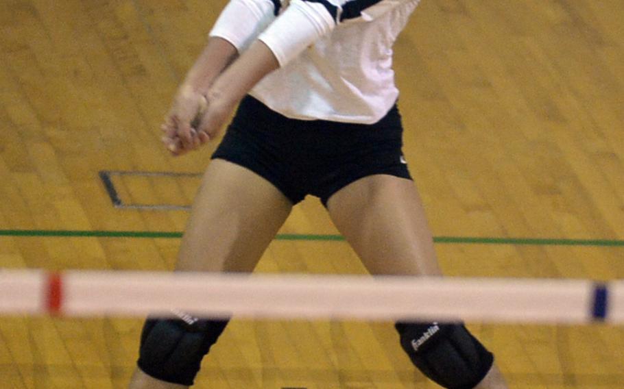 Kadena's Crystalyn Hicom receives serve against Kubasaki during Tuesday's girls volleyball match, won by the Dragons 25-21, 25-15, 25-20.
