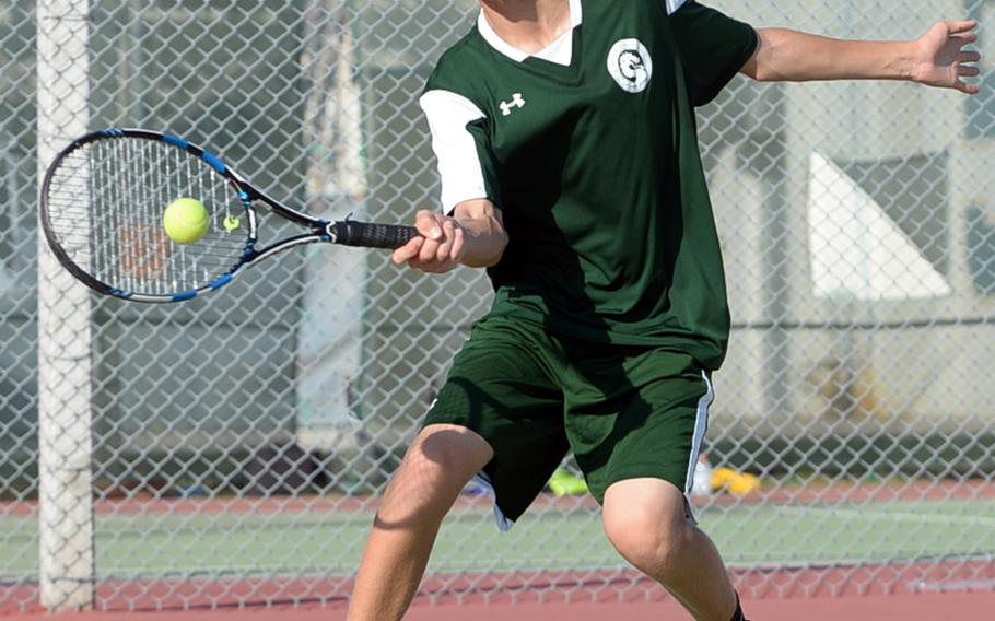 Kubasaki's No. 2 singles seed Shannon Hyde smacks a forehand return against Kadena's Tom Slinger during Tuesday's tennis tie. Hyde won 6-0, 6-1 and the Dragons won the tie 12-2 over the Panthers.