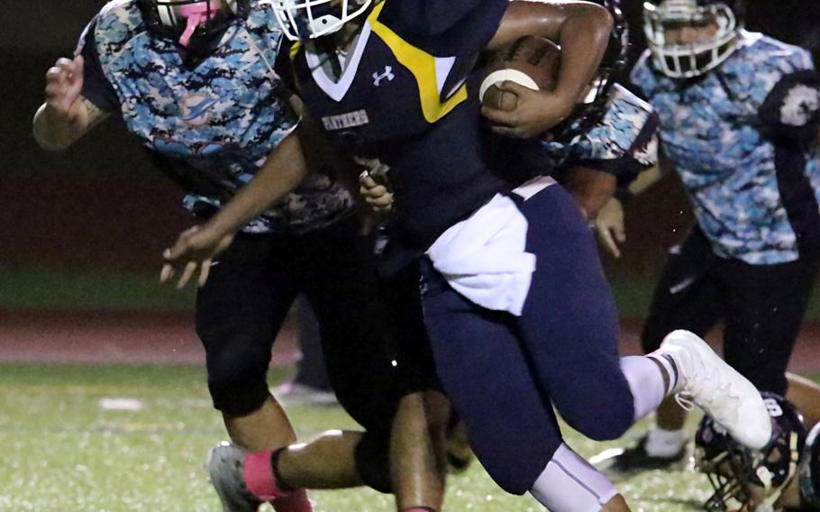 RaSean Jacobs charges past the Southern defense for a Guam High touchdown.