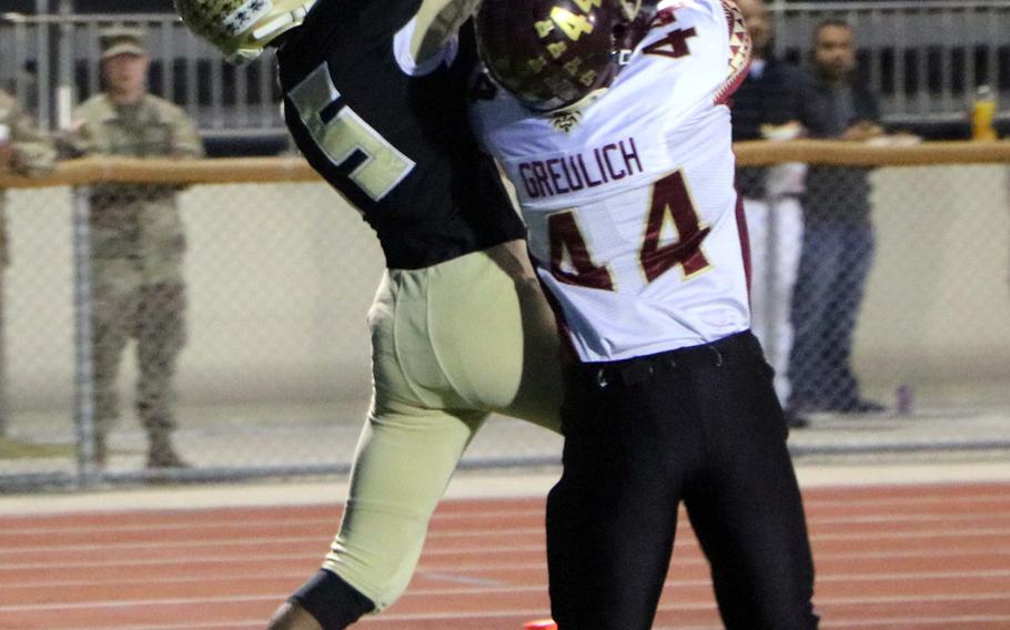 Humphreys receiver Sh'voda Gregory snags a 38-yard touchdown pass against Matthew C. Perry's Zach Gruelich during Friday's football game, won by the Samurai 20-10.