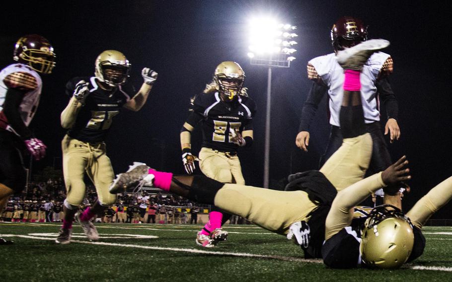 The football bounces in and out of the hands of Humphreys  sophmore David Key’s hand during a 20-10 losing effort against Mathew C. Perry, Friday, Oct. 13, 2017. 